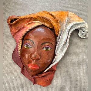 Vintage leather molded face sculpture